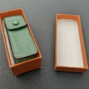 Hermes chewing gum lipstick case green